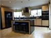 Oak shaker/Gloss black Kitchen with island sink